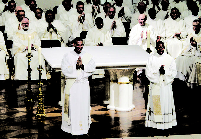 Bishop Farrell ordains two new priests