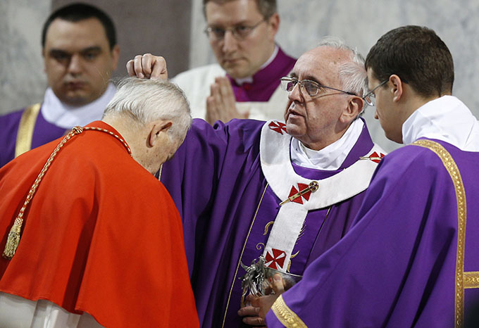 Pope Francis places ashes on head of Slovakian Cardinal Jozef Tomko during Ash Wednesday Mass at the Basilica of Santa Sabina in Rome March 5. (CNS photo/Paul Haring)