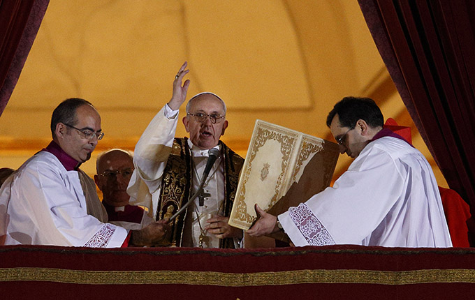 Pope Francis deliver his blessing during his election night appearance on the central balcony of St. Peter's Basilica at the Vatican March 13, 2013. (CNS photo/Paul Haring) 