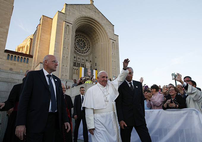 Pope Francis waves as he leaves the Basilica of the National Shrine of the Immaculate Conception after celebrating Mass and the canonization of Junipero Serra Sept. 23 in Washington. (CNS photo/Paul Haring) 
