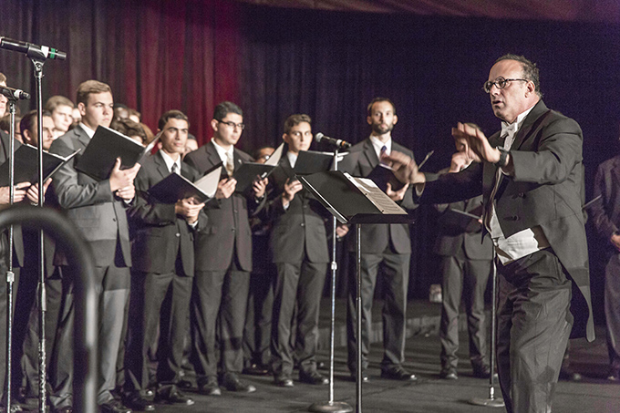 Gregory Hamilton, director of Sacred Music, directs the seminarians at the Spes Gregis Dinner in support of Holy Trinity Seminary on Sept. 19 at the Dallas Hilton Anatole. (Ron Heflin/Special Contributor)