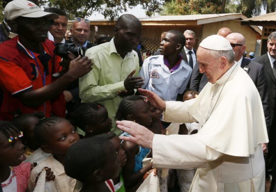 Pope arrives in Africa preaching peace