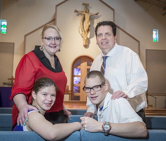 Becky and Steve Daily with their children Natalia, 16, and Connor, 15, at St. Gabriel the Archangel Catholic Church in McKinney on March 6. The family will enter the Catholic Church during the Easter Vigil Mass on March 26. (RON HEFLIN/Special Contributor)