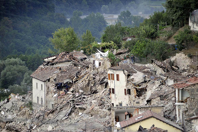 General view of collapsed houses in Pescara del Tronto, Italy, following a following an earthquake Aug. 24. (CNS photo/Cristiano Chiodi, EPA)