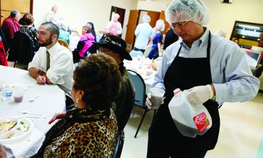 Deacons serve up faith, charity with holiday project
