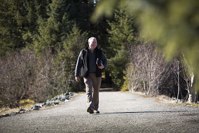Bishop Edward J. Burns of Juneau, Alaska, walks outside of the Shrine of St. Therese in Juneau in this 2014 photo. (CNS photo/Nancy Wiechec) 