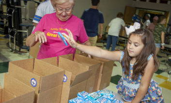Parishioners, students pack boxes for ‘Heroes’