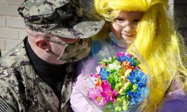 Navy dad, back home after 15 months away, surprises daughter at Catholic school