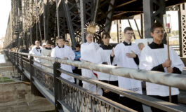 Eucharistic procession makes history crossing river from Iowa to Illinois