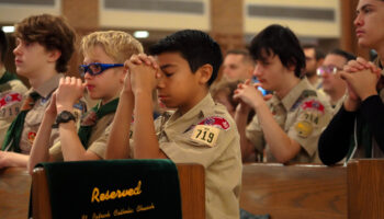Scouts honored for faith, service to parish community